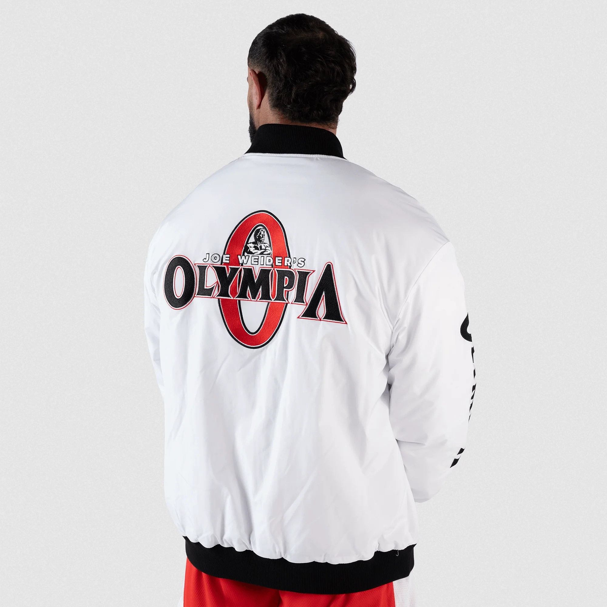 Olympia Signature Bomber Jacket in White – On Model, Back View