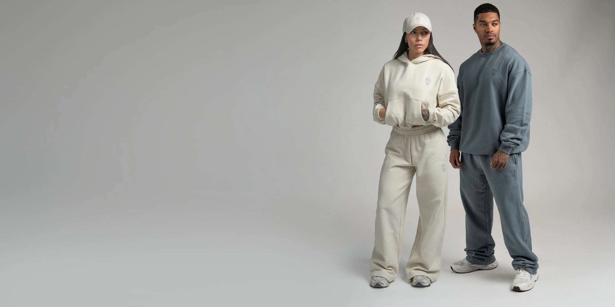 Two athletes in heavyweight hoodie and crew with matching joggers